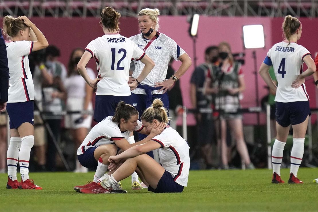 Kelley O'Hara, left, talks to teammate Lindsey Horan after the USWNT's defeat.