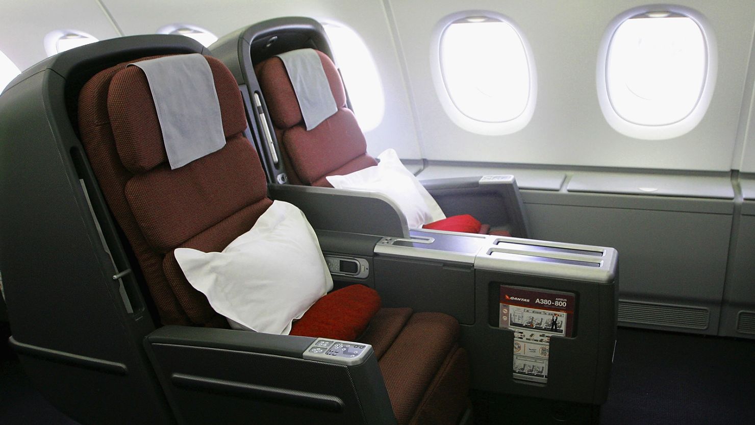 SYDNEY, AUSTRALIA - SEPTEMBER 21:  A general view of the new business class seats onboard the new Qantas A380 flagship the 'Nancy-Bird Walton' as she joins the Qantas fleet at Sydney Domestic Airport on September 21, 2008 in Sydney, Australia. The Qantas A380 will feature seating for 450 passengers across four cabins and will commence commercial services from Melbourne to Los Angeles on October 20, and from Sydney to Los Angeles on October 24.  (Photo by Sergio Dionisio/Getty Images)