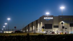 The Amazon.com, Inc. BHM1 fulfillment center is seen before sunrise on March 29, 2021 in Bessemer, Alabama. - Votes are set to be counted on March 29, 2021 on whether to create the first Amazon union in the United States, at a warehouse in Alabama, after a historic, five months-long David vs Goliath campaign. "I'm proud of the workers at Amazon for standing up and saying enough," said Joshua Brewer, the local president of the Retail, Wholesale and Department Store Union. (Photo by Patrick T. FALLON / AFP) (Photo by PATRICK T. FALLON/AFP via Getty Images)