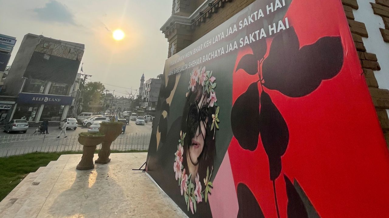 A mural at a vigil site was defaced with black paint.