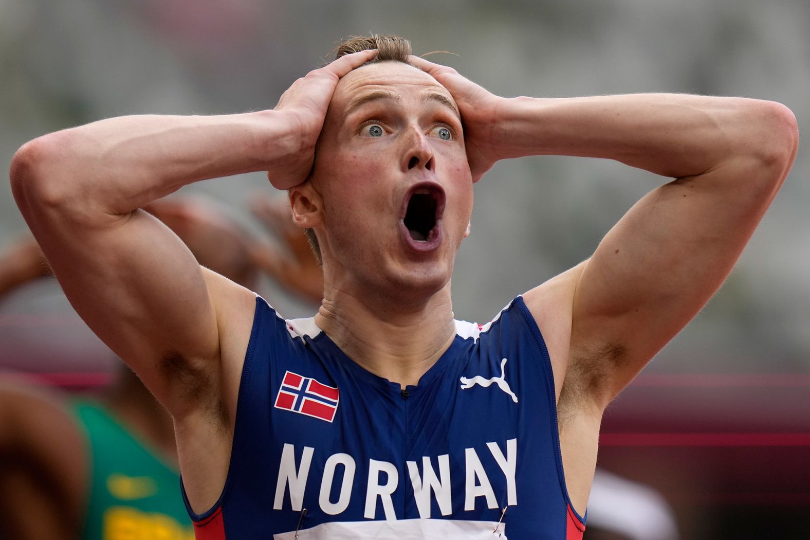 Norway's Karsten Warholm celebrates after winning gold in the 400-meter hurdles on August 3. Warholm finished the race in 45.94 seconds, <a href="index.php?page=&url=https%3A%2F%2Fwww.cnn.com%2Fworld%2Flive-news%2Ftokyo-2020-olympics-08-02-21-spt%2Fh_c575aefe40b0453a64105030fdda4b1c" target="_blank">breaking his own world record.</a>