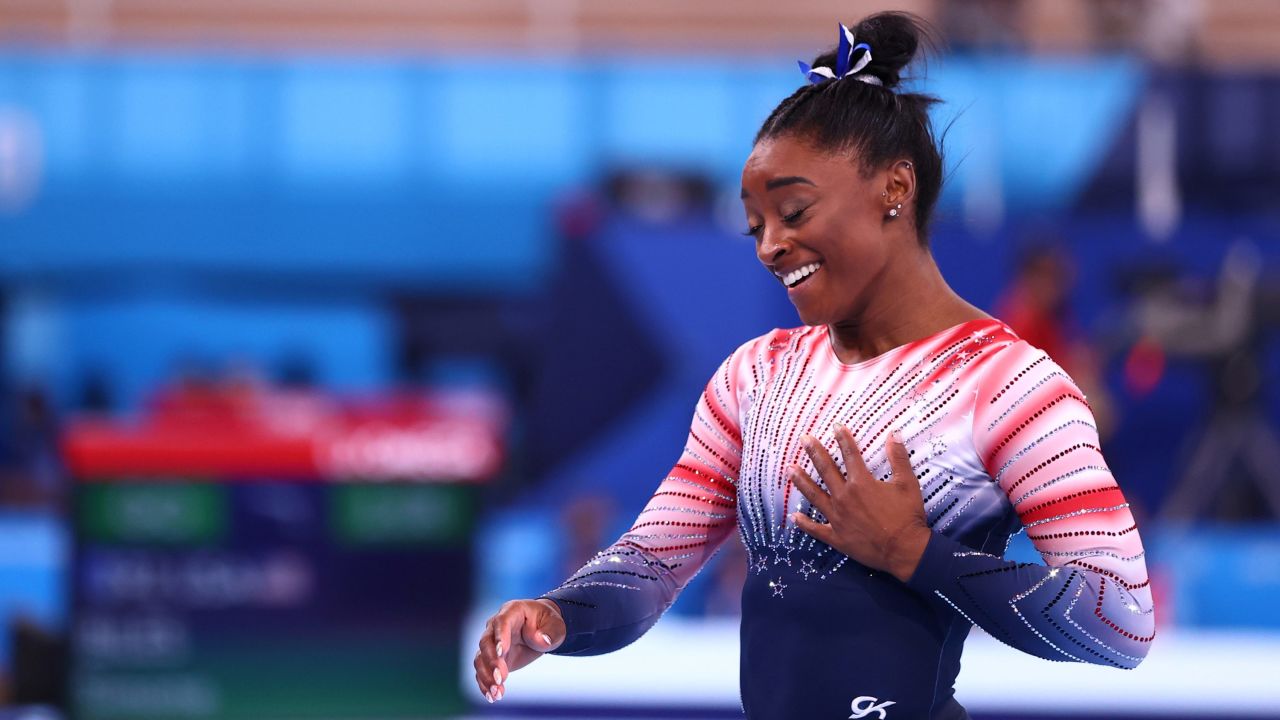 Biles reacts after her routine. When she was done, she received a standing ovation.