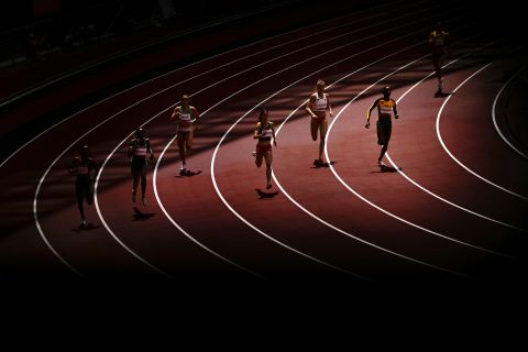 Athletes compete in a 400-meter heat on August 3.