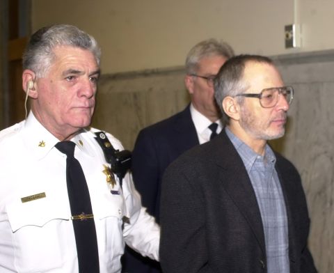 Durst is escorted from a courthouse in Easton, Pennsylvania, in 2002.
