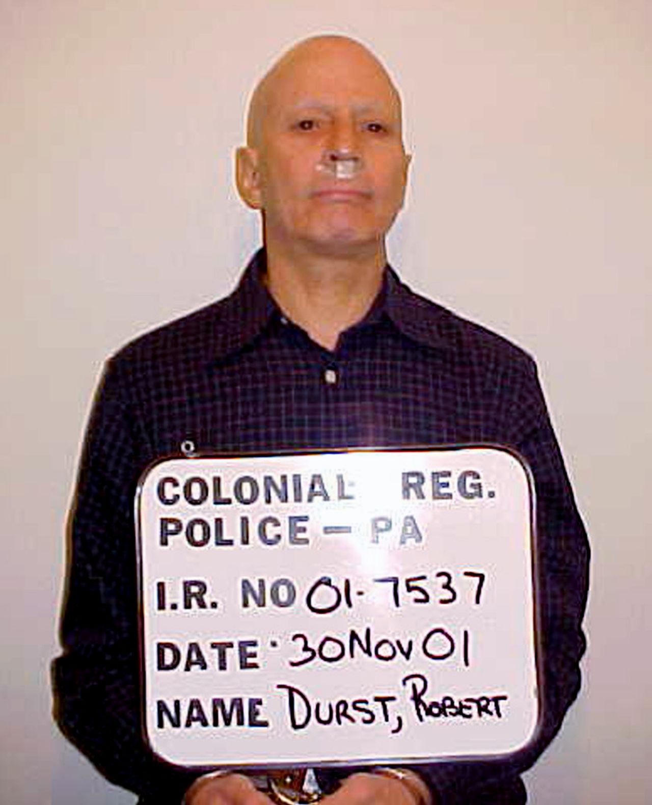 Durst is seen in this November 2001 booking photo after he jumped bail and was arrested in Pennsylvania. Durst was arrested for shoplifting a sandwich even though he had hundreds of dollars in his pocket.