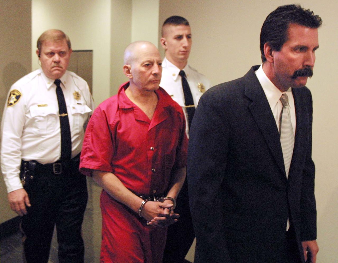 Durst is escorted to a Northampton County courtroom before a hearing in December 2001.