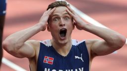 Norway's Karsten Warholm reacts after winning and breaking the world record in the men's 400m hurdles final during the Tokyo 2020 Olympic Games at the Olympic Stadium in Tokyo on August 3, 2021. (Photo by Giuseppe CACACE / AFP) (Photo by GIUSEPPE CACACE/AFP via Getty Images)