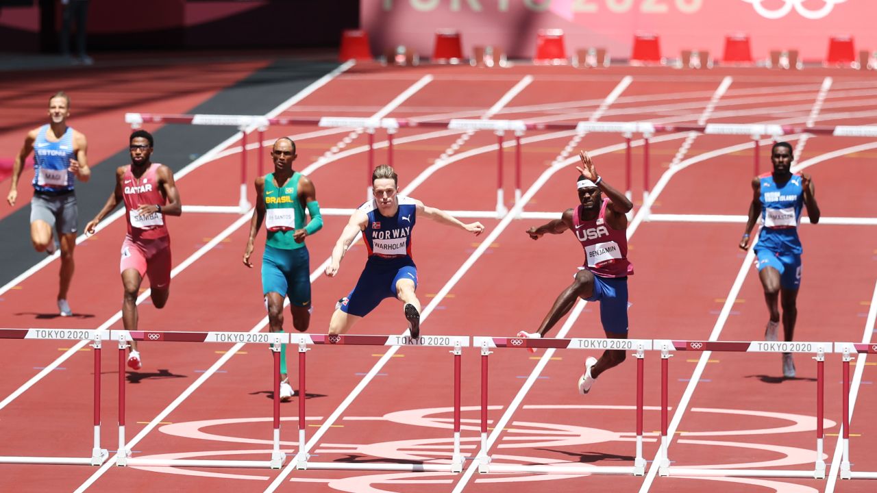 Warholm and Benjamin jump the final hurdle in the 400m hurdles final.