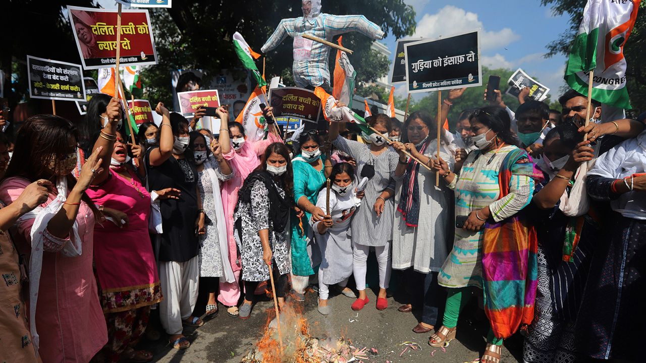 Protesters burn an effigy of Indian Prime Minister Narendra Modi and Delhi Chief Minister Arvind Kejriwal during a demonstration in Delhi on August 3.