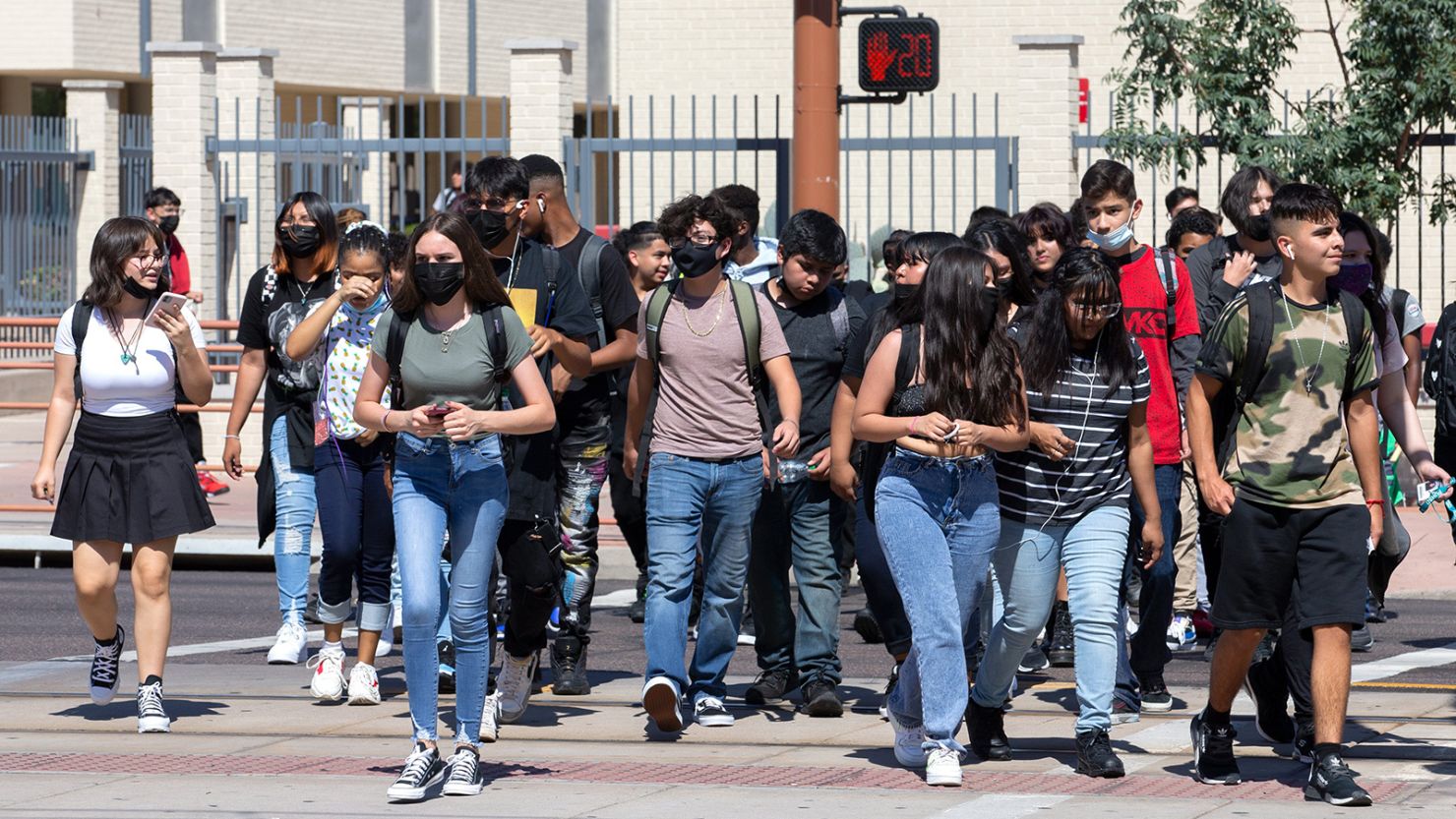 Students leave after their first day at Central High School in Phoenix on August 2, 2021.