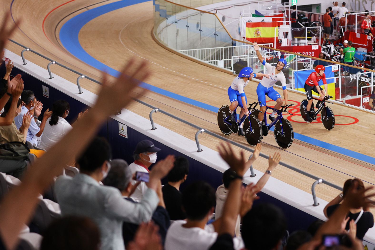 From left, Italy's Simone Consonni and Filippo Ganna celebrate after <a href="https://www.cnn.com/world/live-news/tokyo-2020-olympics-08-04-21-spt/h_78cf746b97bccd1690781b8701b0f329" target="_blank">setting a new world record</a> and winning a gold medal in the team pursuit event on August 4.