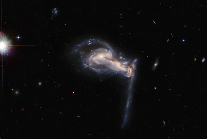Hubble captured an image of three galaxies in a tug-of-war millions of light-years from Earth. This system is known as Arp 195 and was included in the <a href="index.php?page=&url=https%3A%2F%2Fned.ipac.caltech.edu%2Flevel5%2FArp%2Fpaper.pdf" target="_blank" target="_blank">Atlas of Peculiar Galaxies</a>.