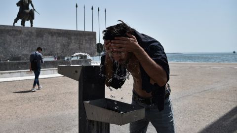 A man cools off with water during a heatwave in Thessaloniki, Greece, on July 29.