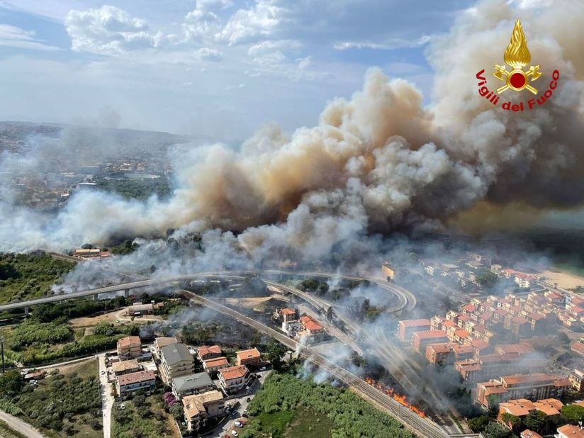 A handout photo from the Italian National Fire Brigade shows an aerial view of a fire in the Pineta Dannunziana reserve in Pescara, Italy, on August 1.