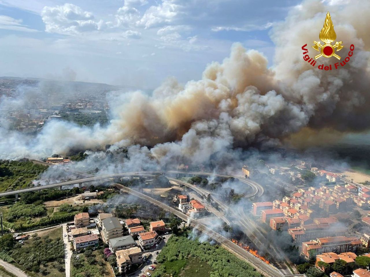 A handout photo from the Italian National Fire Brigade shows an aerial view of a fire in the Pineta Dannunziana reserve in Pescara, Italy, on August 1.