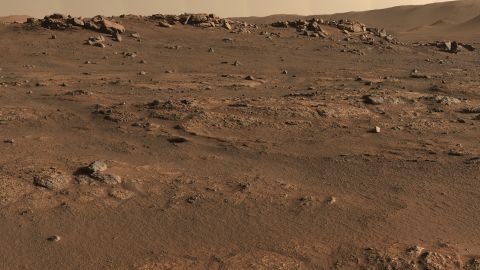 Perseverance shows off its "office space" in this panorama of its first drill site at the "Crater Floor Fractured Rough" unit.