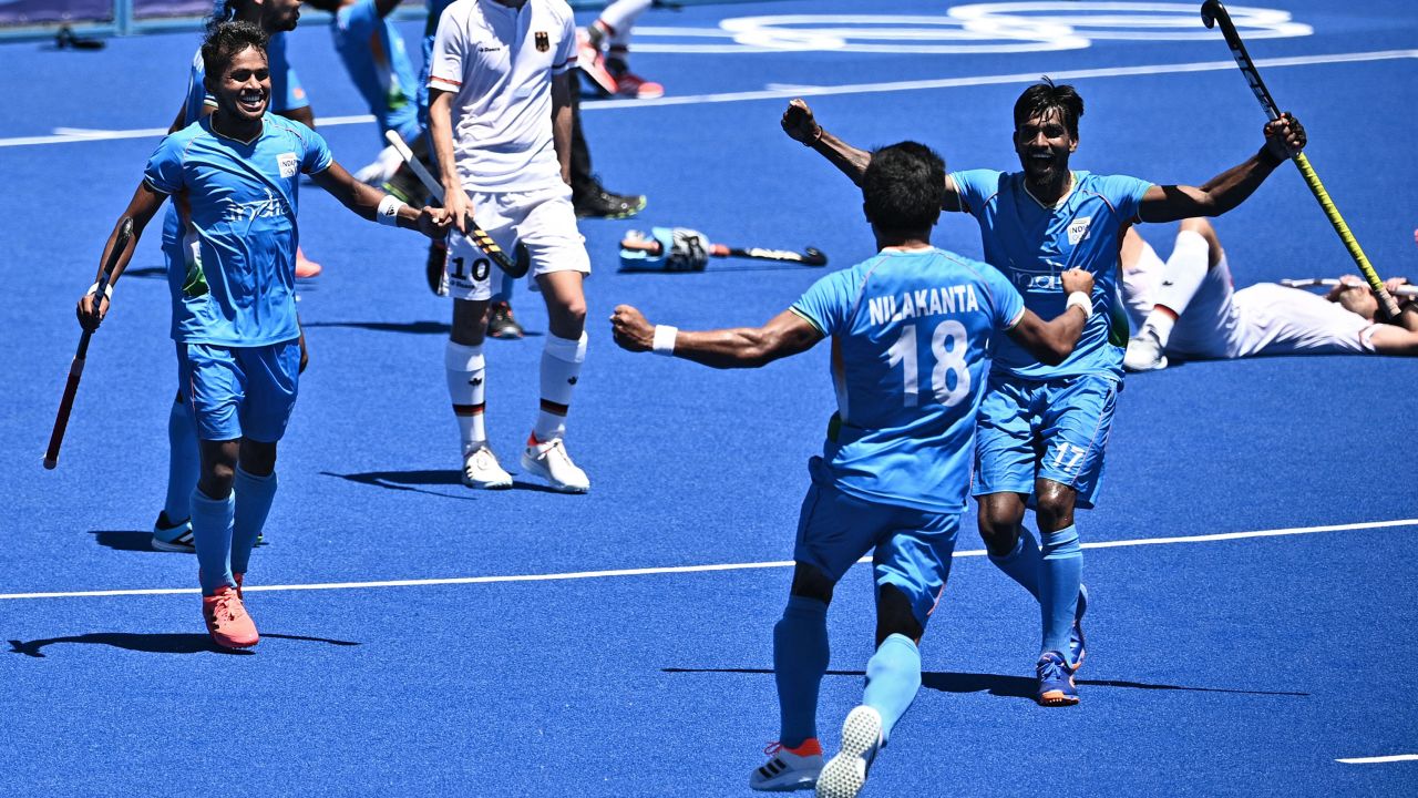 Players of India celebrate after winning the men's bronze medal match.