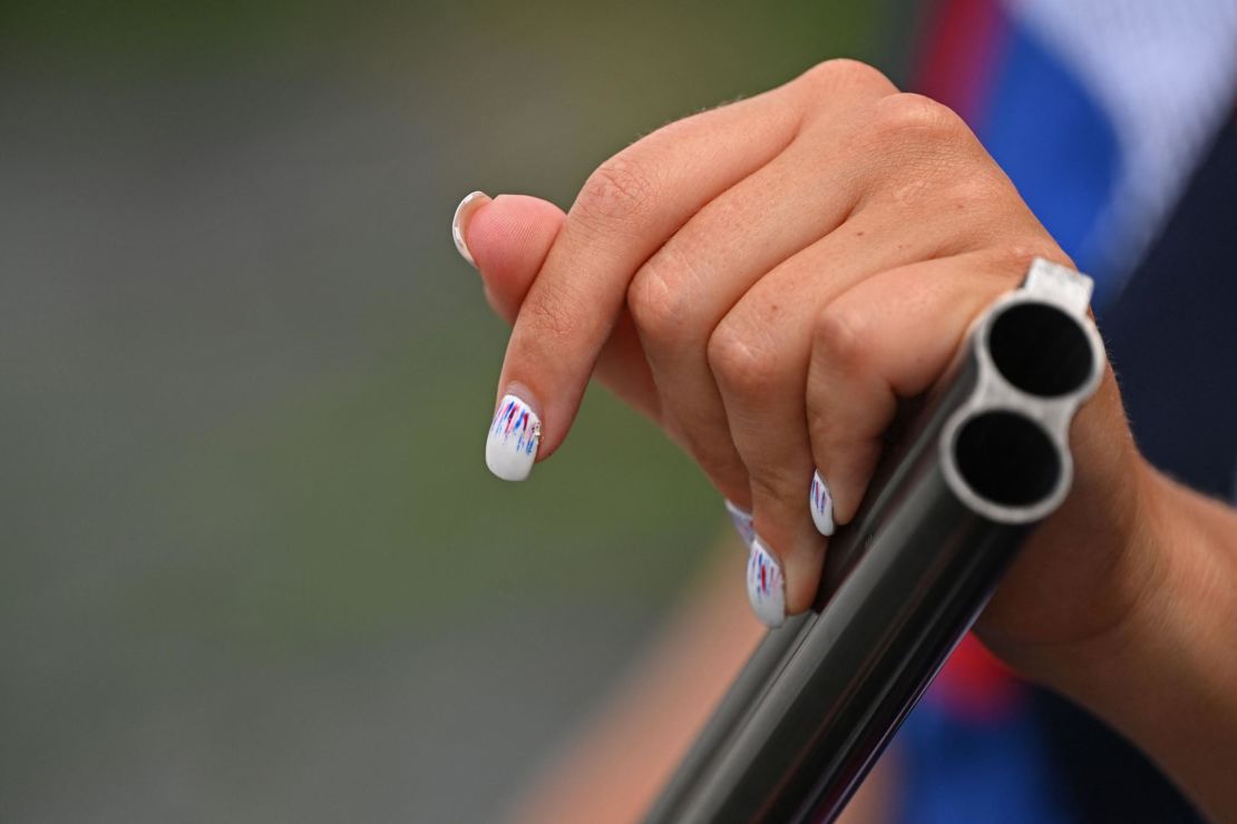 The French flag-inspired manicure of shooter Melanie Couzy during the 2020 Tokyo Olympics.