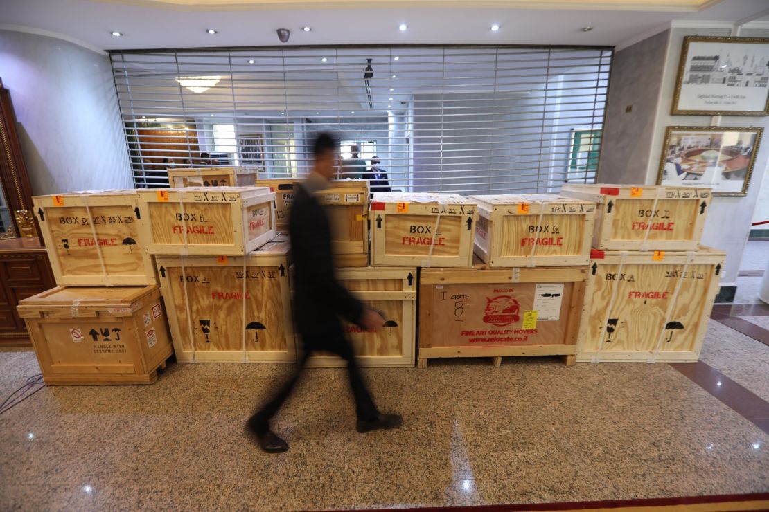 Boxes containing some of the repatriated items on display in Baghdad.
