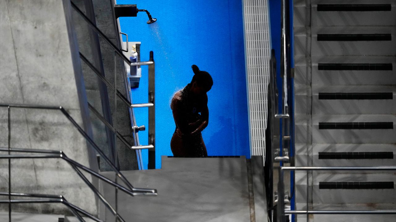 Jennifer Abel of Canada rinses off in between rounds of the women's diving 3-meter springboard preliminary event at the Tokyo Olympics on July 30.