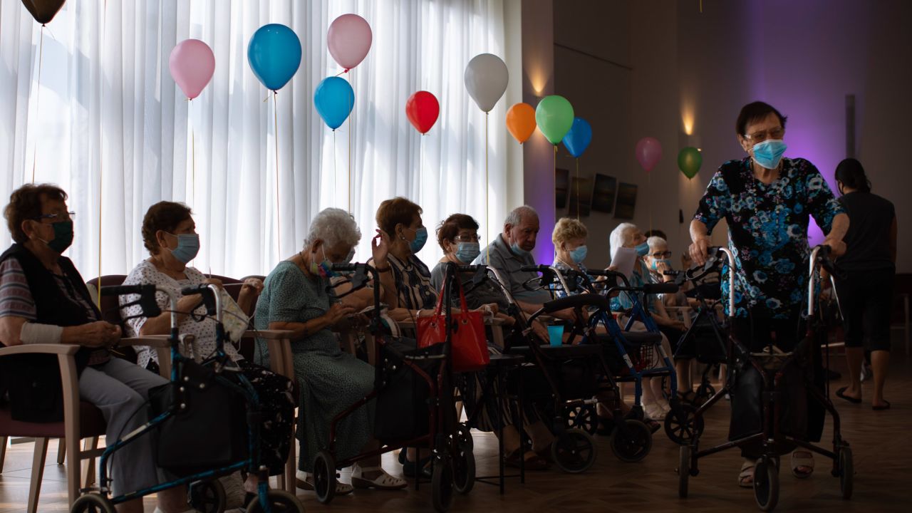 Elderly Israelis wait to receive their third shot of the Pfizer vaccine at a nursing home in Netanya in August. 