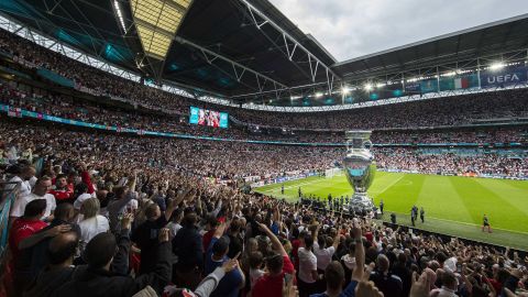 A large inflatable version of the trophy is seen on the pitch before the UEFA Euro 2020 Championship Final between Italy and England at Wembley Stadium on July 11, 2021.