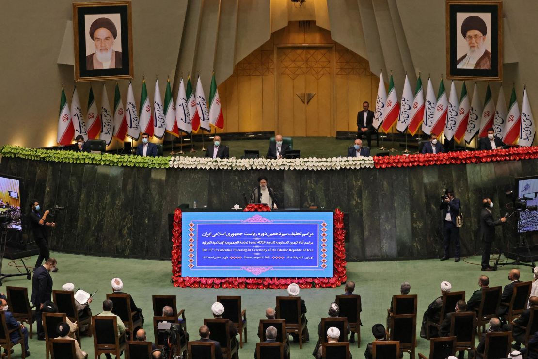 Iran's newly elected President Ebrahim Raisi (C) speaks at his swearing in ceremony at the Iranian parliament in the capital Tehran on August 5, 2021.