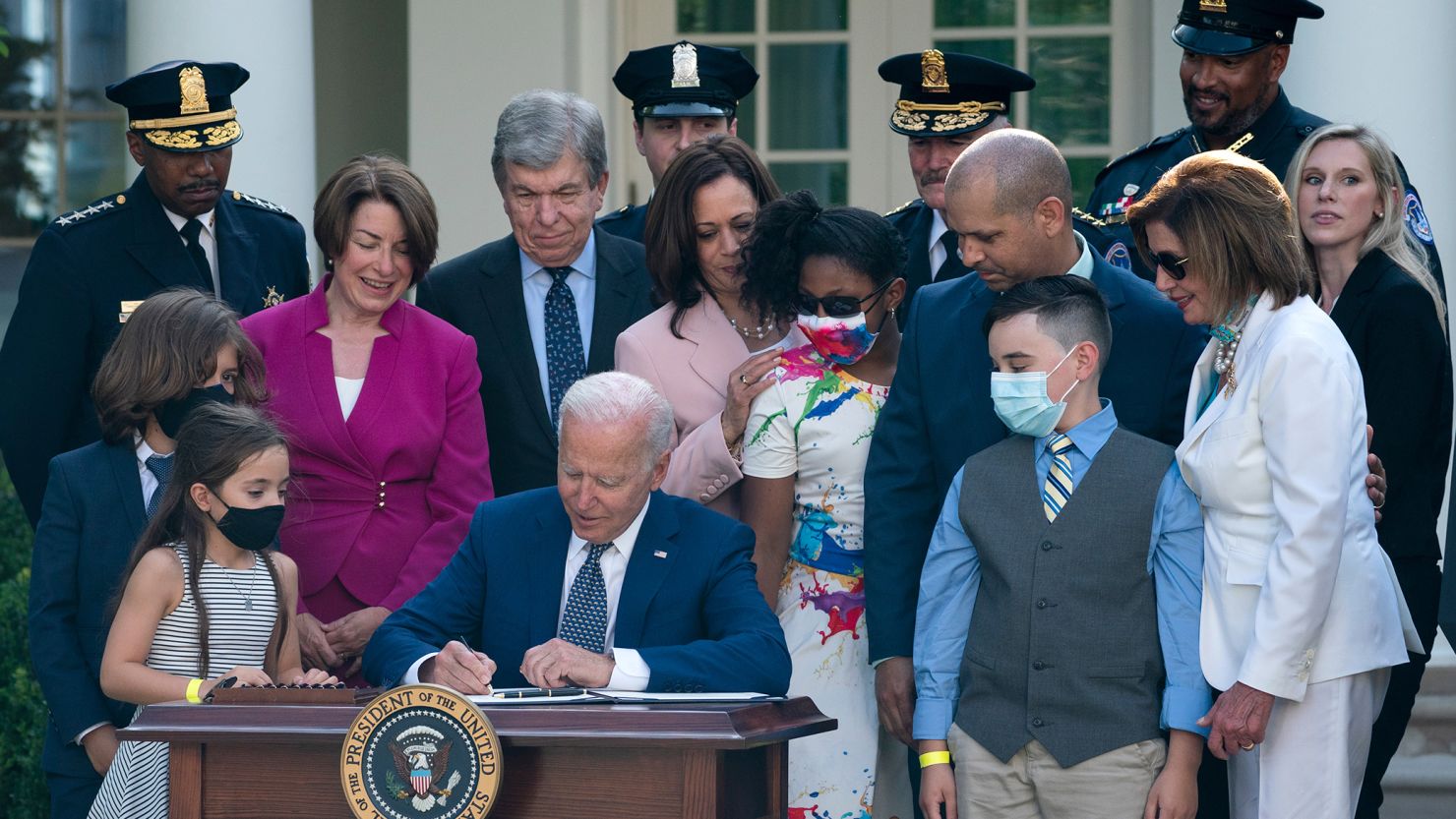 President Joe Biden signs a bill that awards Congressional gold medals to law enforcement officers that protected members on Congress at the Capitol during the January 6 riots.