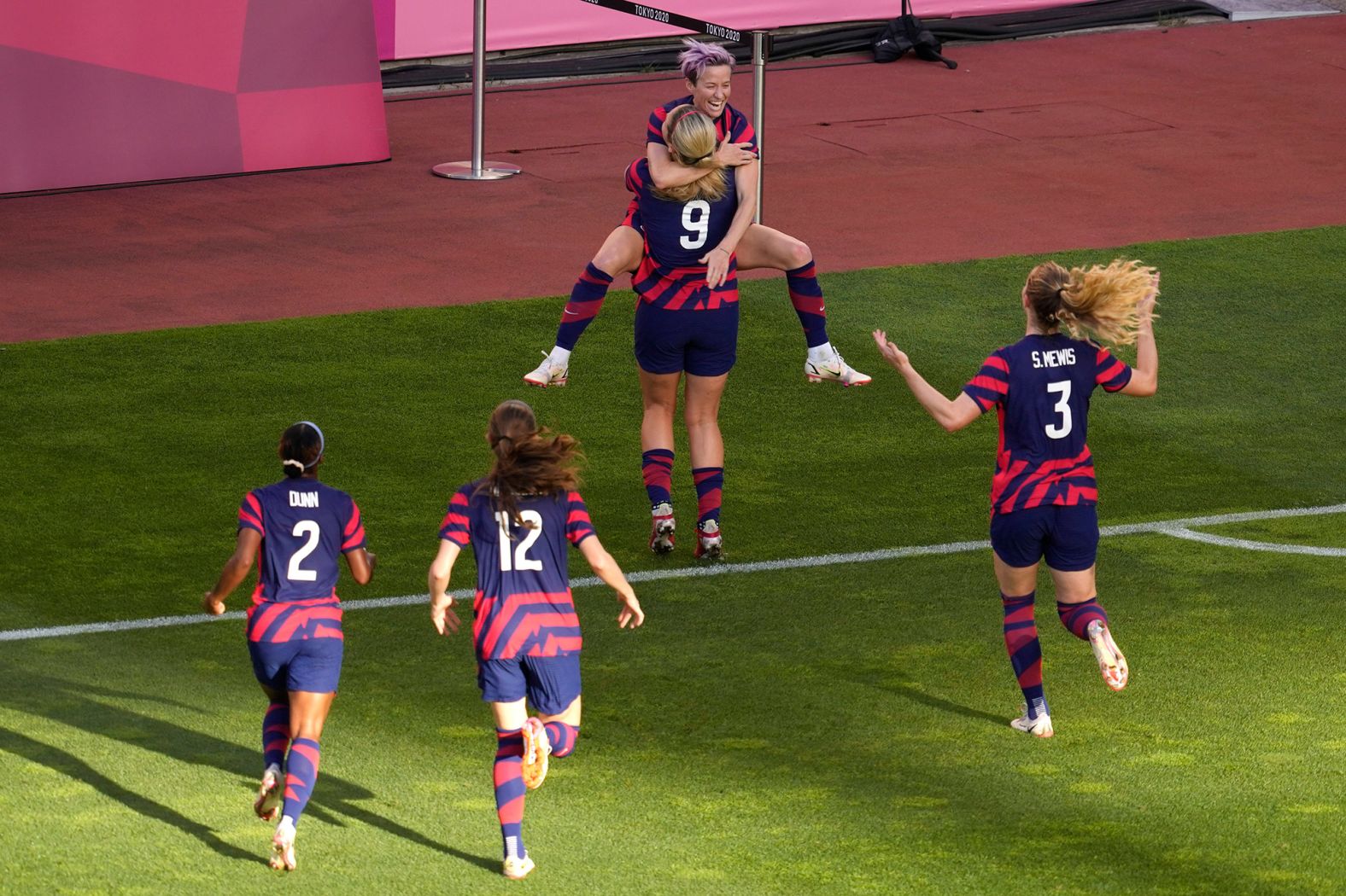 The United States' Megan Rapinoe celebrates with her teammates after scoring the opening goal of the bronze-medal match against Australia on August 5. It was an Olimpico goal, which is a goal straight from a corner kick, and she later added another score as <a href="index.php?page=&url=https%3A%2F%2Fwww.cnn.com%2Fworld%2Flive-news%2Ftokyo-2020-olympics-08-05-21-spt%2Fh_3d38ca534ac779dbd51a3419ada50589" target="_blank">the United States won 4-3.</a>
