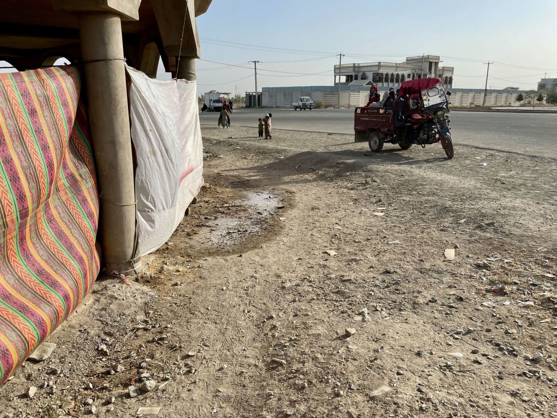 An unfinished construction site is now the site of an informal camp housing around 30 families who have fled the violence. A tuk-tuk delivers new arrivals.