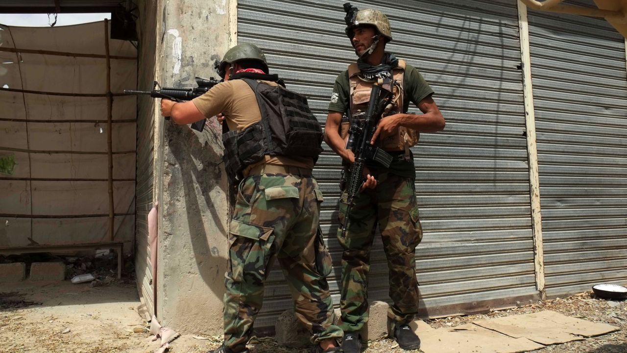 An Afghan security force member exchanges fire with Taliban militants after U.S. forces conducted an airstrike in Kandahar city, capital of Kandahar province, southern Afghanistan, July 23, 2021.  The U.S. military in the past few days conducted airstrikes in Afghanistan to support Afghan security forces, the Pentagon said on Thursday.   At least two of the strikes targeting military equipment that the Taliban had taken from the Afghan forces, and others targeting Taliban fighting positions, including at least one strike in the southern province of Kandahar, said the report. (Photo by Sanaullah Seiam/Xinhua via Getty Images)