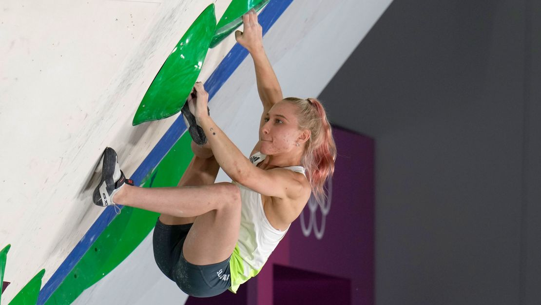 Garnbret competes in the bouldering element of the women's sport climbing final.