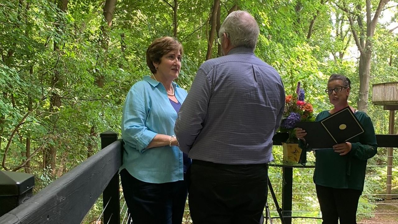 <strong>New chapter:</strong> They had a small backyard wedding at Saquet's home in Michigan. They're excited for this next chapter together and looking forward to future travels when the situation allows.
