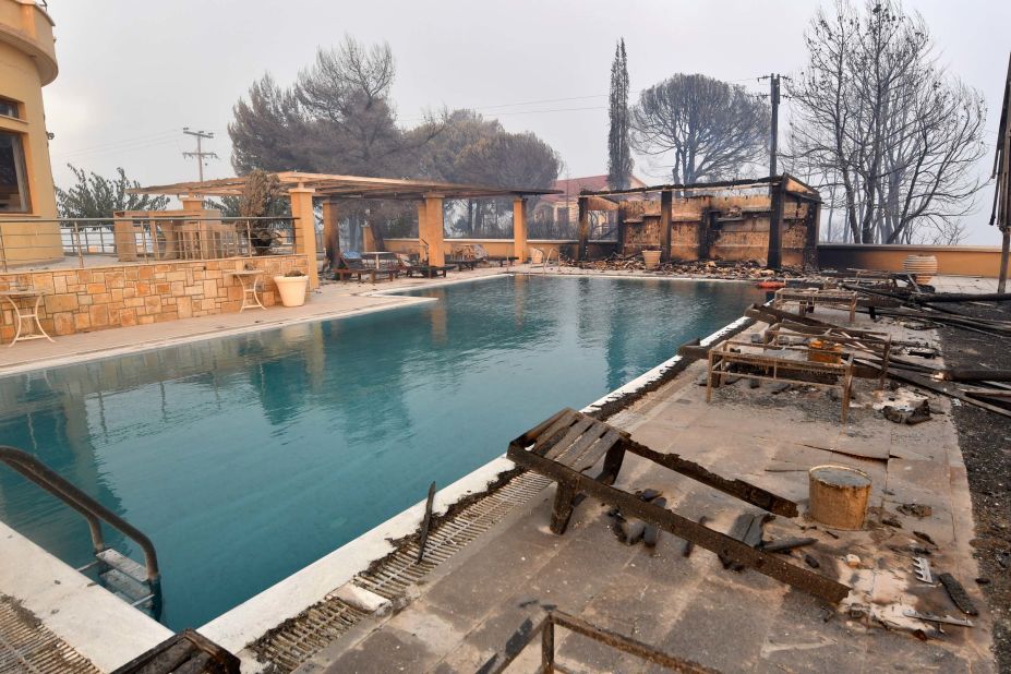 The grounds of a burnt hotel are seen in Lalas village, near Olympia, on August 5.