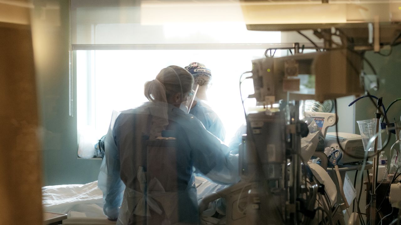 Nurses check on a patient in the ICU Covid-19 ward at NEA Baptist Memorial Hospital in Jonesboro, Arkansas, on Wednesday, August 4.