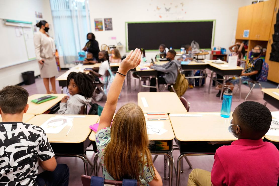 Students at Tussahaw Elementary School  in McDonough, Georgia, on August 4, 2021.  Schools have begun reopening in the US, with most states leaving it up to local schools to decide whether to require masks. 