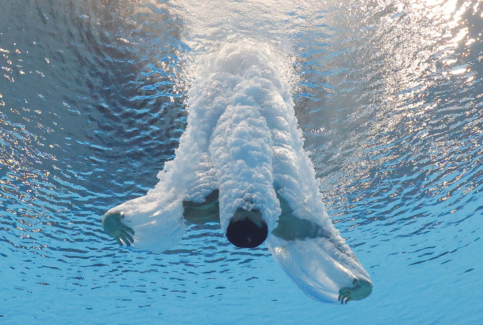 Chinese diver Cao Yuan competes in the 10-meter platform event on August 7. He won the gold and became the first athlete to win Olympic gold medals in three different diving events. He won gold in the 3-meter springboard in 2016, and he won gold in the 10-meter synchronized event in 2012. 