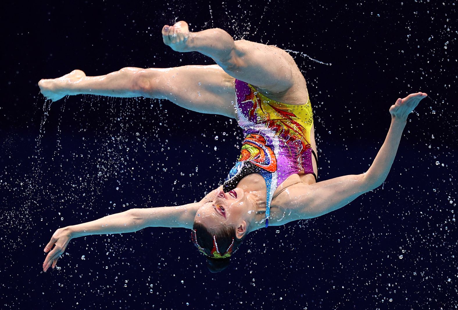 A Russian artistic swimmer competes in the team event on August 7. <a href="index.php?page=&url=https%3A%2F%2Fwww.cnn.com%2Fworld%2Flive-news%2Ftokyo-2020-olympics-08-07-21-spt%2Fh_2383664d8b845653690edb64f8fe7554" target="_blank">Russian swimmers won gold</a> in both the team and duet events in Tokyo.