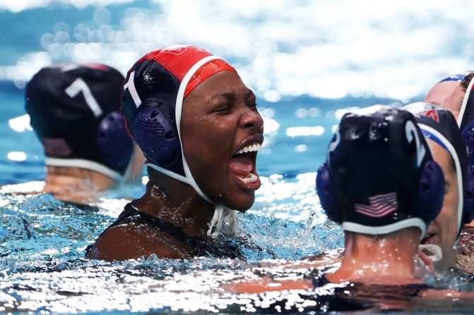 Ashleigh Johnson celebrates after the United States defeated Spain in the <a href="index.php?page=&url=https%3A%2F%2Fwww.cnn.com%2Fworld%2Flive-news%2Ftokyo-2020-olympics-08-07-21-spt%2Fh_b1f5bd339ce782ce5cdecc2684560047" target="_blank">water polo final</a> on August 7. It's the third straight gold for the Americans, who won 14-5. That's the largest margin of victory in the history of water polo's gold-medal matches.