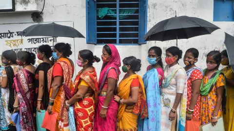 Women wait to receive the Covishield vaccine at a health center in Siliguri, West Bengal. India blocked vaccine exports in March to battle a devastating second wave of infections.
