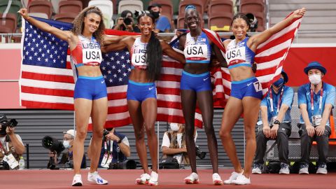 Team USA celebrates the relay win at Tokyo 2020.