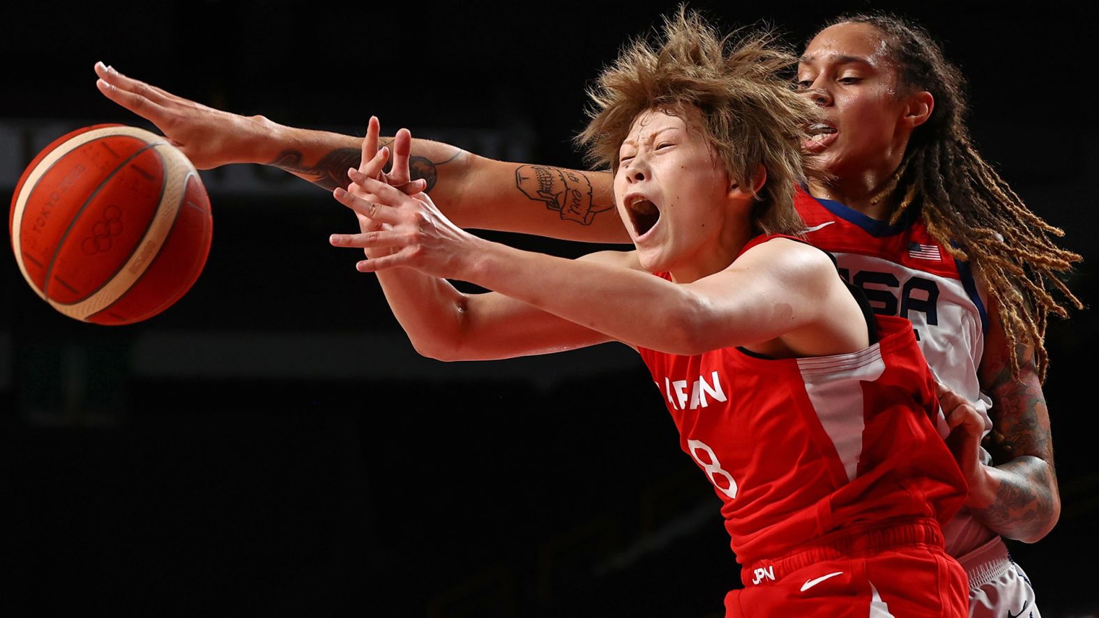 The United States' Brittney Griner, right, defends Japan's Maki Takada during the gold-medal basketball game on August 8. Griner scored 30 points as <a href="index.php?page=&url=https%3A%2F%2Fwww.cnn.com%2Fworld%2Flive-news%2Ftokyo-2020-olympics-08-08-21-spt%2Fh_503bb19990d71b68b2d84343466c24c1" target="_blank">the Americans won 90-75.</a> It is the seventh consecutive gold medal for the US women's basketball team.