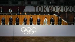 Olympic and government officials applaud during the closing ceremony in the Olympic Stadium at the 2020 Summer Olympics, Sunday, Aug. 8, 2021, in Tokyo, Japan. (AP Photo/Vincent Thian)
