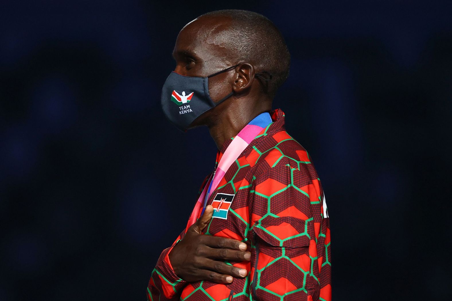 Kenya's Eliud Kipchoge, who won the gold medal in the marathon, listens as his country's National Anthem is played during his medal ceremony. The medal ceremonies for both the men's and women's marathon took place during the closing ceremony. And that meant two playings of the Kenyan National Anthem, as Kenya's Peres Jepchirchir won gold in the women's event.