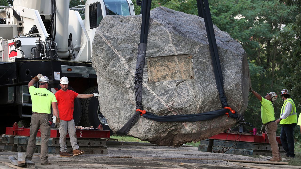 Crews work to remove Chamberlin Rock from Observatory Hill on the University of Wisconsin campus in Madison on Friday.