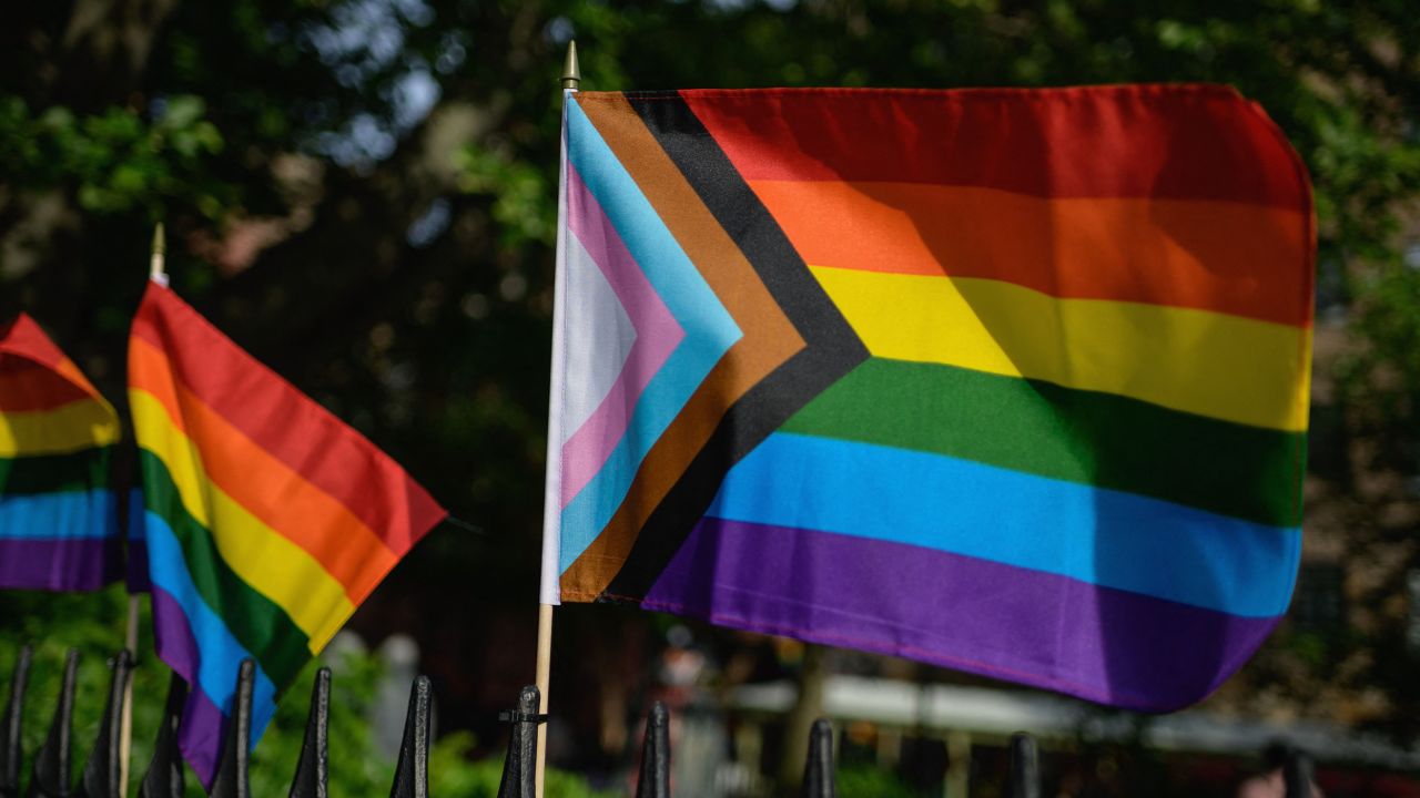 A Progress Pride flag and rainbow flags are seen at the Stonewall National Monument, the first US national monument dedicated to LGBTQ history and rights, on June 1, 2020 in New York City. 