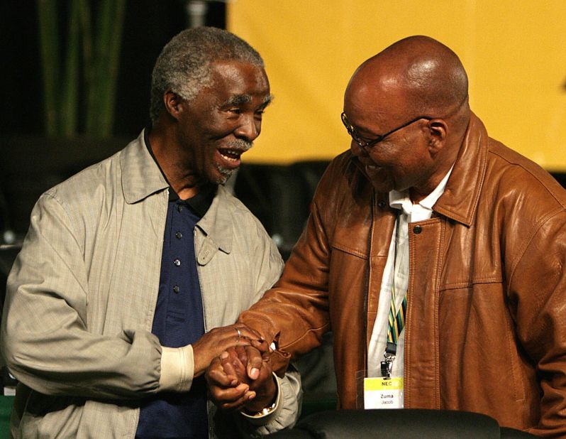 Zuma, right, is congratulated by Mbeki after defeating him to become the new president of the ANC in December 2007.