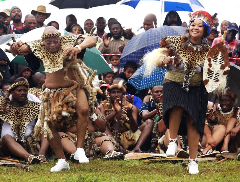 Zuma sings and dances with his new wife, Thobeka Mabhija, at their wedding ceremony in January 2010. It was the fifth marriage for the polygamous Zuma.