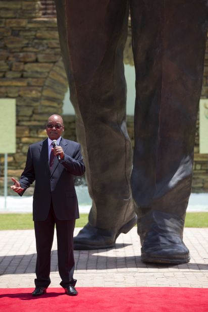 Zuma unveils a giant statue of Mandela at the Union Buildings in Pretoria, South Africa, in December 2013.