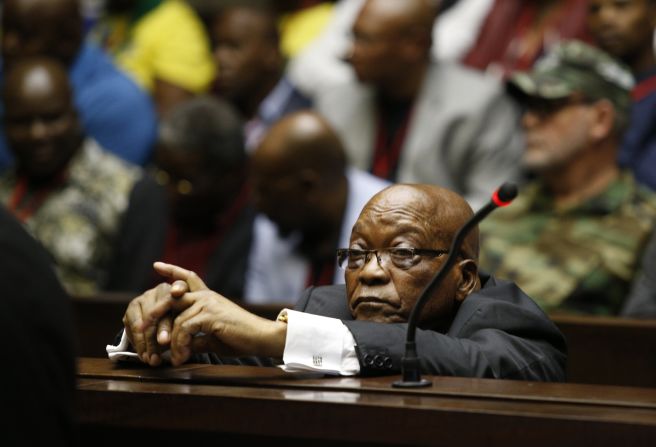 Zuma sits in the dock at the High Court in Pietermaritzburg, South Africa, in November 2018. <a href="index.php?page=&url=https%3A%2F%2Fwww.cnn.com%2F2018%2F04%2F06%2Fafrica%2Fsouth-africa-jacob-zuma-court-intl%2Findex.html" target="_blank">He was charged with 16 counts of corruption, money laundering and racketeering</a> stemming from a billion-dollar government arms deal. He has denied all the allegations against him.